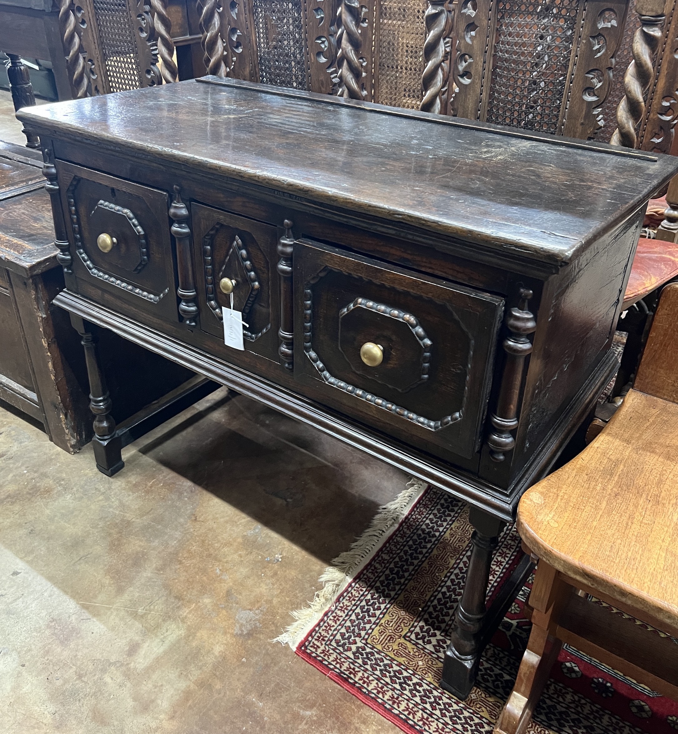 An 18th century style small oak three drawer low dresser, width 98cm, depth 46cm, height 79cm